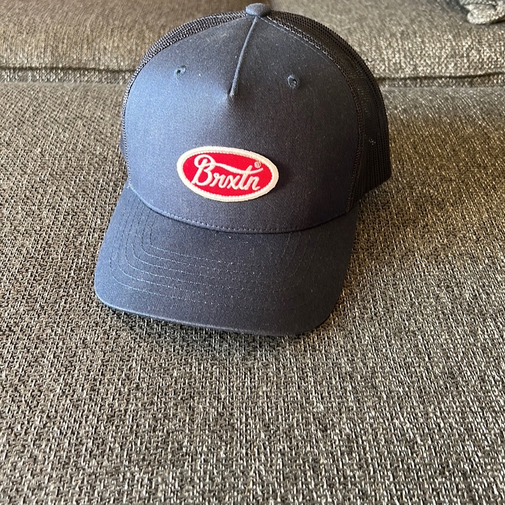 Brixton trucker hat.